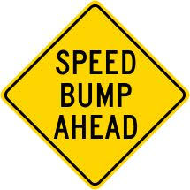 Black And Yellow Arrow Sign Meaning Speed Bump Ahead Warning Sign Speed Bump Bump Ahead Signs