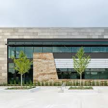 Fiber Cement Panels In Neptune Office Building From Swisspearl Cement Panels Office Building Facade Cladding