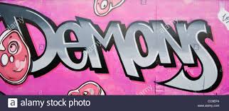Brightly Coloured Colored Aerosol Spray Paint Graffiti Wall Art And Style Writing Stock Photo Alamy