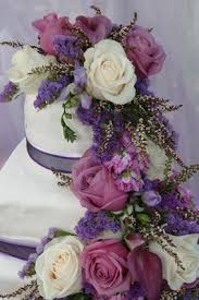 Whatever the reason purple flowers are beautiful, and they are sure to draw the attention of your guests. Purple Wedding Flowers Purple Wedding Flower Ideas Purple Wedding Bouquets Trees With Purple Flowers
