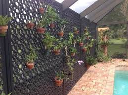 We also carry landscaping and garden supplies, from garden gloves and garden shears to rubber mulch and rain barrels that catch and conserve runoff. Decorative Vinyl Privacy Lattice Panel Roman At Menards Backyard Pergola Small Pergola Metal Pergola