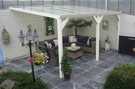 mooie terras tegels en overkapping door mijnspeeltuin utomhusrum utomhusliv pergola