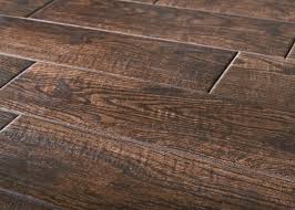 Natural Wood Floors Vs Wood Look Tile Flooring Which Is Best For Your House Designed Wood Look Tile Floor Wood Ceramic Tiles Natural Wood Flooring