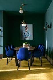 Round seating is comfortable and special. Color Dark Dining Room Green Dining Room Dining Room Blue Modern Dining Room