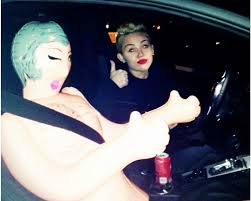 Miley Cyrus Finds a Travel Companion in a Blow-Up Doll — PHOTO  (20121224)- Tickets to Movies in Theaters, Broadway Shows, London Theatre  & More | Hollywood.com