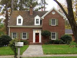 It has the red brick, white trim black shutter look. Pb091521 Jeff Shutters Front Best Brick Exterior House Red Brick House House Shutters