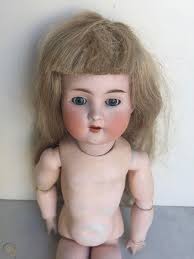 Marked body bruno schmidt, celluloid, modeled hair, fixed glass eyes, standing doll body, crank joint parts, joints loosened, clothed, used, partial color abrasion on the hair and minor damage to the pony, h 37.5cm. Bruno Schmidt Doll 1824968359