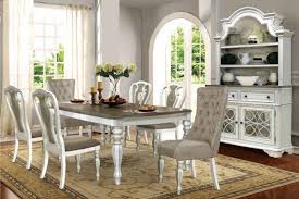 This dining set gives an antique look to the area where ever it is placed and mesmerizes the customers at a single glance. Mc Ferran D738 7pc 7 Pc One Allium Way Birchlane Antique White Finish Wood Dark Top