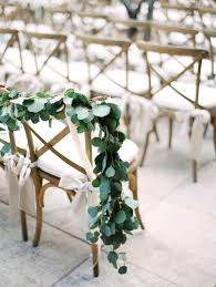 How Beautiful Is This Eucalyptus Garland Draped On The Back Of The Ceremony Chairs Wedding Chairs Wedding Flowers Ceremony Chairs