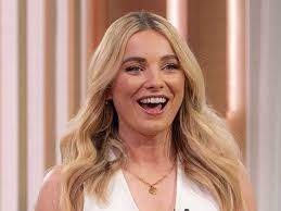 Sian Welby's outfit makes me want to wear a white linen suit