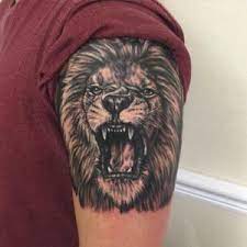 Top 30 Excellent Roaring Lion Tattoo Ideas January 2021 Mens Lion Tattoo Roaring Lion Tattoo Lion Shoulder Tattoo