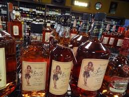 Pin By Sin City Liquors More On Sin City Liquors More Our Store Spiced Rum Liquor Store Rose Wine Bottle