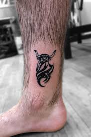 Tattoos were placed on the outside of the arm for. Tattoo Uploaded By Taylor Geiger Tribal Bull Tattoo 1122931 Tattoodo