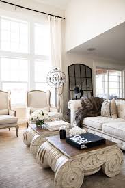 Rh's distressed ionic capital coffee table:a salvaged wooden ionic capital served as the inspiration for our striking table. Our Living Room Makeover Mia Mia Mine