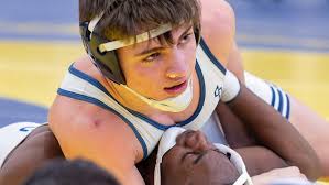 Hartland can't be intimidated by 'cool singlet kids' in team wrestling  finals