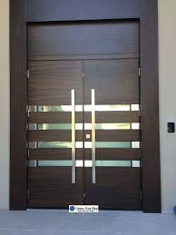 Enjoy a sleek and modern entryway that gives off a modern, yet traditional feel that your guests are sure to admire. Door Gallery Contemporary Front Doors Double Front Doors Contemporary Doors