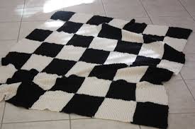 Our throw blankets and plush blankets are available in a variety of styles and colors, making them a perfect way to warm up any living space design. Enjoy It By Elise Blaha Cripe Project 24 Of 26 A Checkerboard Knit Blanket