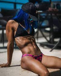 WWE's Sasha Banks shows off some serious abs by the pool following recent  success on The Mandalorian | The US Sun