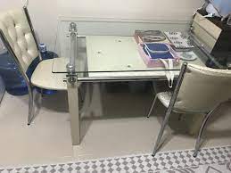 Yemek masası ve kahvaltı masası olarak kullanabileceğiniz,ahşap masa,modern masa,cam masa,açılır masa,tahta ayak masa,kelebek masa çeşiterin ve dahası burada! Bej Cam Mutfak Masa Takimi 4 Sandalyeli Modelleri Ve Fiyati Dekopasaj