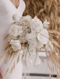 Flowerless weddings are also beautiful. We Re All About The Modern Monochrome In This Wintry Wedding Inspiration Green Wedding Shoes Wedding Flower Arrangements Floral Wedding Decorations Wedding Flower Guide