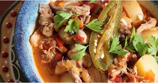 This traditional puerto rican stew with rice features chicken thighs, garlic, green olives, and adobo seasoning. Puerto Rican Holiday Recipes Popsugar Latina