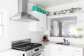 Why this white kitchen works:the large set of windows above the sink lets ample light filter in throughout the day. 12 Ways To Brighten A Kitchen When It S Starved Of Natural Light