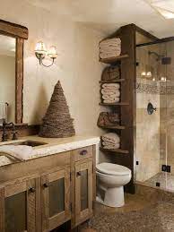 A lot of these ideas make you feel like living in a cabin or cottage in the woods due to the number of logs used in the bathroom. Rustic Bathroom Design Ideas The Home Builders Rustic Bathroom Remodel Rustic Bathroom Lighting Rustic Bathrooms