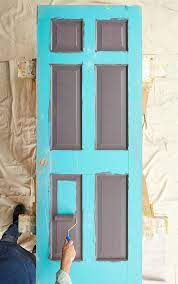 Using a paint sprayer or airless sprayer for painting interior wood doors. How To Paint An Interior Door Like A Pro Better Homes Gardens