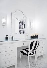 Black And White Striped Vanity Chair A Black And White Stripe French Chair Sits On Marble Floor Tiles At A White Makeup Vanity Accented With White Makeup Vanity Vanity Chair Makeup Vanity Storage