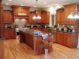 medium tone wood kitchen cabinets