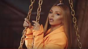 There's a lot of female empowerment, lots of songs give a nod to being yourself. Jesy Nelson S Orange Blazer In The Video Little Mix Woman Like Me Ft Nicki Minaj Spotern