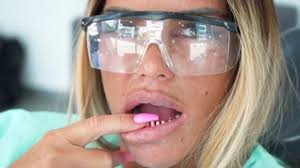 Katie price showing off the pearly whites in the maldives todaycredit: Katie Price Has Been Left Mortified As Her New Veneers Fall Out
