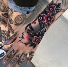 First seen in the 1860 paintings of johannes oertel, it is a religious image that many americans, tattooists and clients included, resonated with. Rose Of No Man S Land Tattoos Tattoo Life