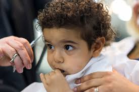 Choosing a haircut for any kid can be tough, and when it comes to little boys' haircuts, being easy to style and care for is a tapered cut with curls creates a mini mohawk shape that's a breeze to style. 6 Strategies To Prepare Your Child For Back To School Haircuts Hospital Visits And More Baby Haircut Toddler Boy Haircuts Boys First Haircut