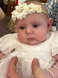 Congratulations and welcome to God's Family! Reese Sharon Woods, daughter  of Christian and Leah Baptized today at Immaculate Conception Church.  “Called by Name to be a Child of God”