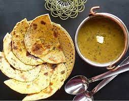 Black Lentil Dal With Flaky Roti Missi Roti Indian Food Recipes Bread Recipe Without Milk