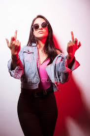 What is the difference between contemptuous and contemptible? Contemptuous Young Pink Dressed Woman In Sunglasses Standing At White Wall And Showing Middle Fingers Hispanic Sensual Stock Photo 223509704