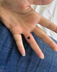 Small Black Heart Tattoo On Finger In 2020 Black Heart Tattoos Heart Tattoo On Finger Finger Tattoo For Women