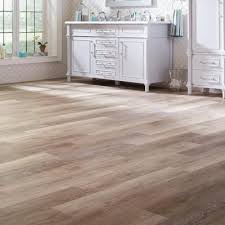 Trying to decide whether to do the grip strip planks or the click and lock planks. Grip Strip Vinyl Plank Flooring Vinyl Flooring The Home Depot