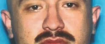 California murder suspect arrested near Roop Street in Carson City