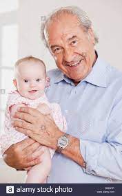 Old Man Holding Baby High Resolution Stock Photography And Images Alamy