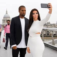 Kanye west stands at 5 feet 8 inches. Kim Kardashian Kanye West Madame Tussauds London