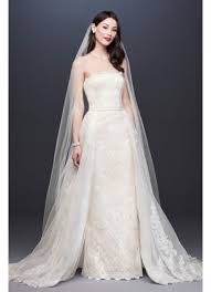 Saying yes to the dress is difficult, and, naturally, budget plays an important role in that decision. Lace Sheath Wedding Dress With Removable Overskirt David S Bridal