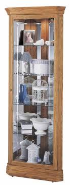 These wooden glass corner display cabinets are great will tuck neatly into your home.i hope you will like this video & if you like this video please give a. Howard Miller Hammond 680 347 Oak Corner Curio Cabinet