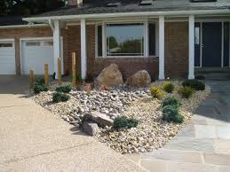 Small Rock Garden With Bamboo Stalks Garden Landscape Design Rock Garden Landscape Design