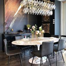 This is no time to dawdle. Who Says Dining Rooms Can T Be Elegant And Kid Friendly Oval Dining Table Faux Leather Chairs Oval Table Dining Dining Room Table Decor Dining Room Table