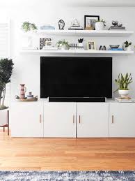 If you don't want to have visible cables crawling around your entertainment center, you can always use this 36'' floating shelf with cable management. 40 Ideas For Decorating Around The Tv A House Full Of Sunshine