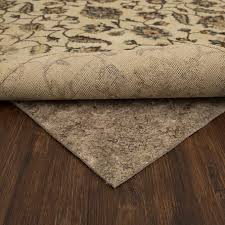 Kmart has rug pads to help prevent slipping. All Surface Reversible Area Rug Pad 8 Ft X 10 Ft Costco