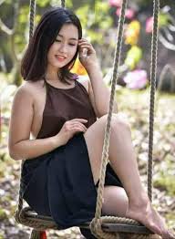 In 19 century, ao yem has a square piece is cloth with one corner cut away to fit under the woman's throat. Ghim Tren Vietnam Traditional Dress Ao Yem