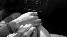 Couple holding hands in car. Holding Hands In Car Gifs Tenor